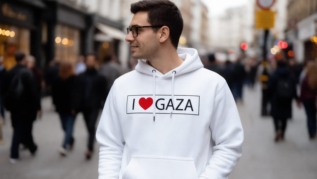 Man in a white I Love Gaza hoodie on Whitechapel Road in east London