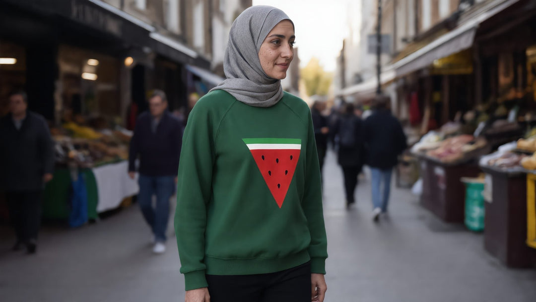 Woman in a green Triangle Watermelon sweatshirt on Green Lanes in north London