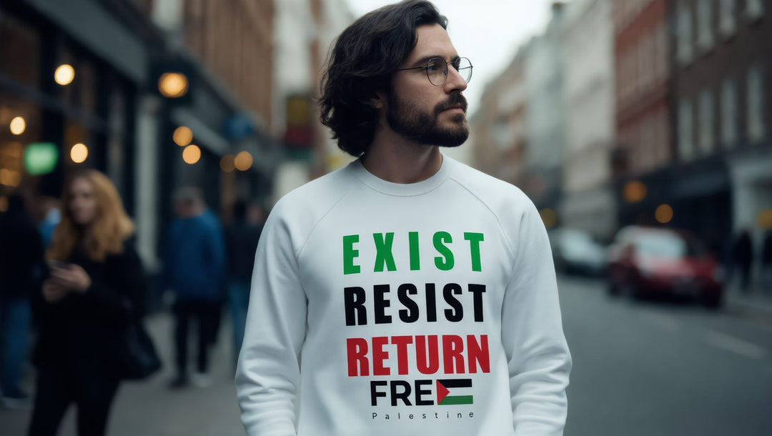 Man in a white Exist Resist Return sweatshirt on Charing Cross Road in London