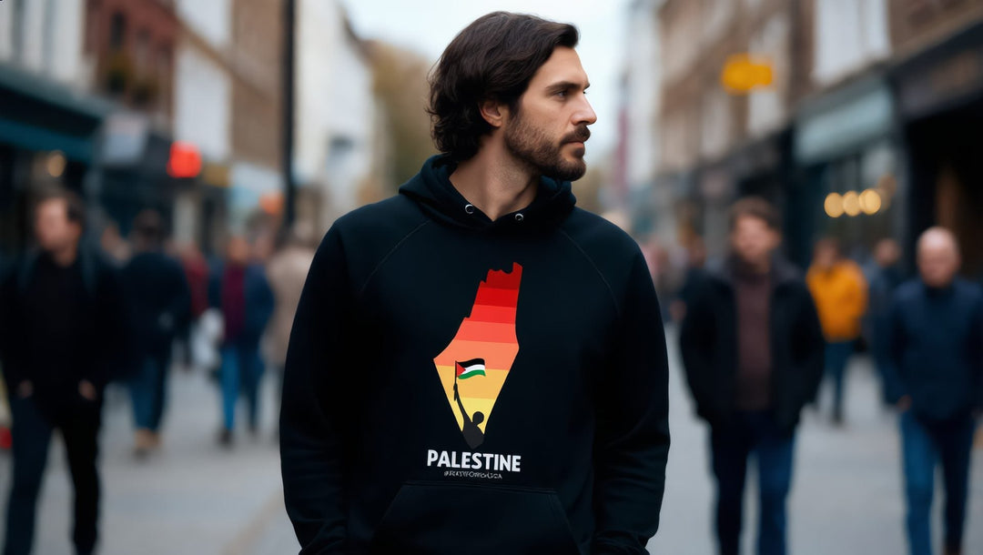 Man in a black Palestine Map hoodie on a street in Camden Town, London