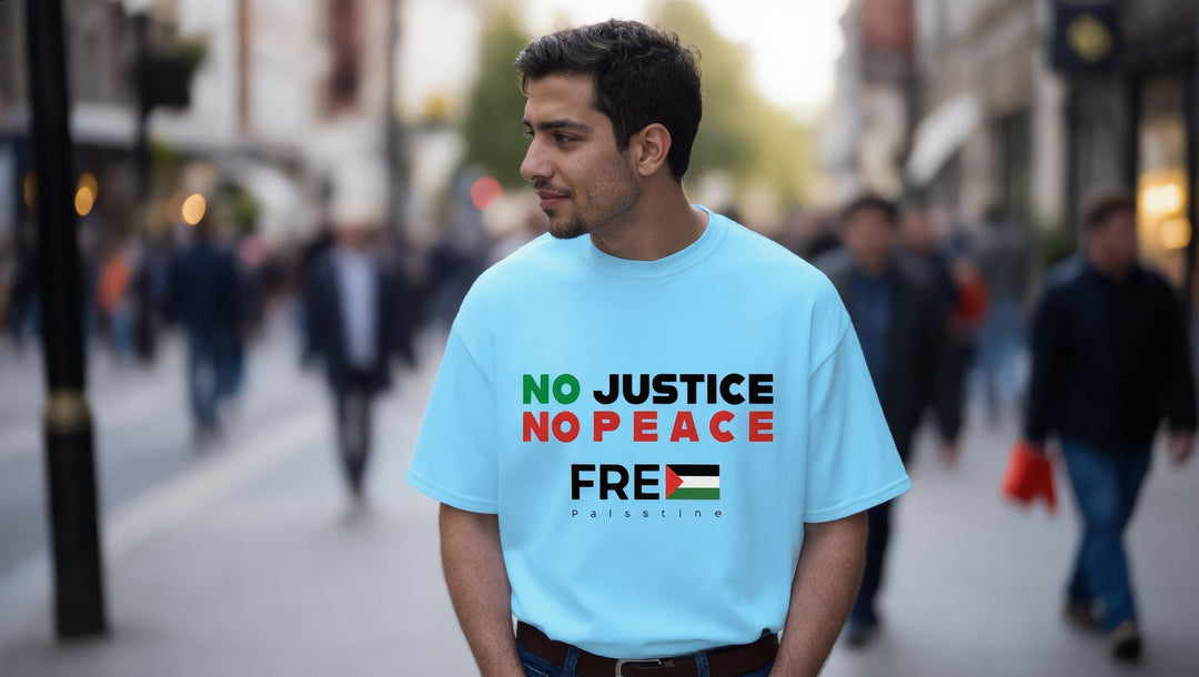 Man in a sky blue No Justice No Peace T-shirt on the King's Road in London