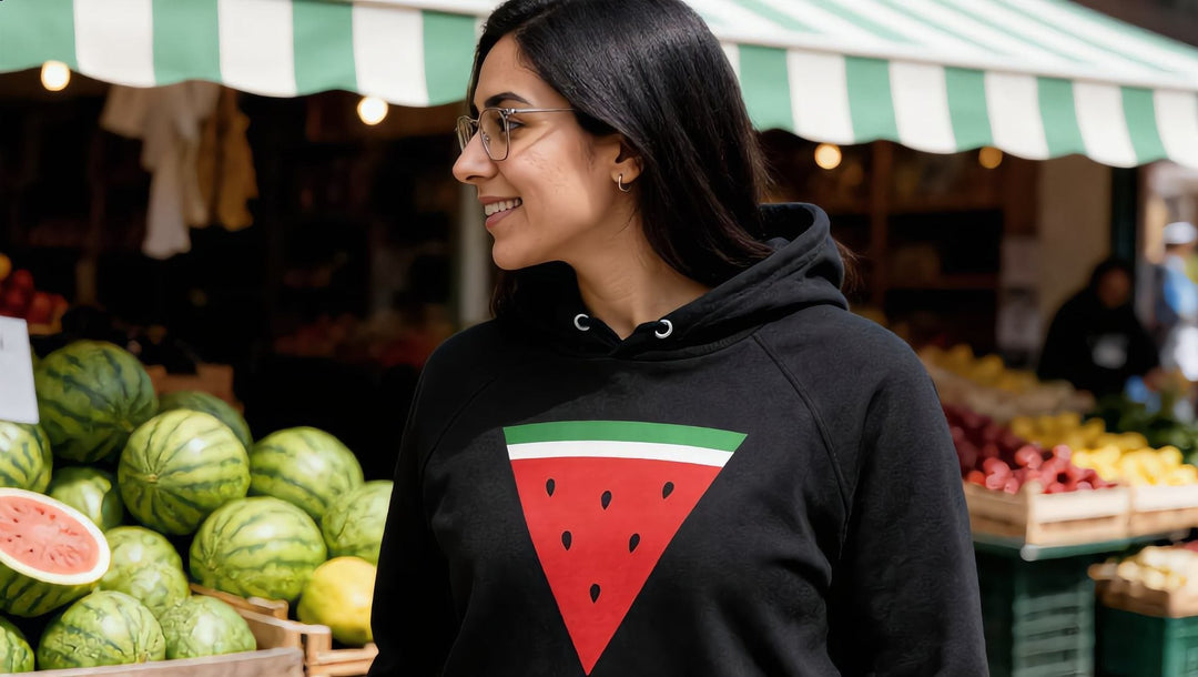 Woman in a Triangle Watermelon hoodie at Chapel Market, Islington