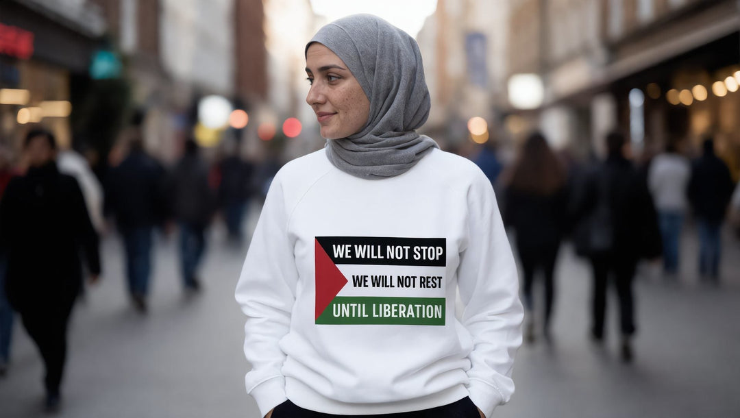 Woman in a We Will Not Stop sweatshirt on The Broadway, Stratford