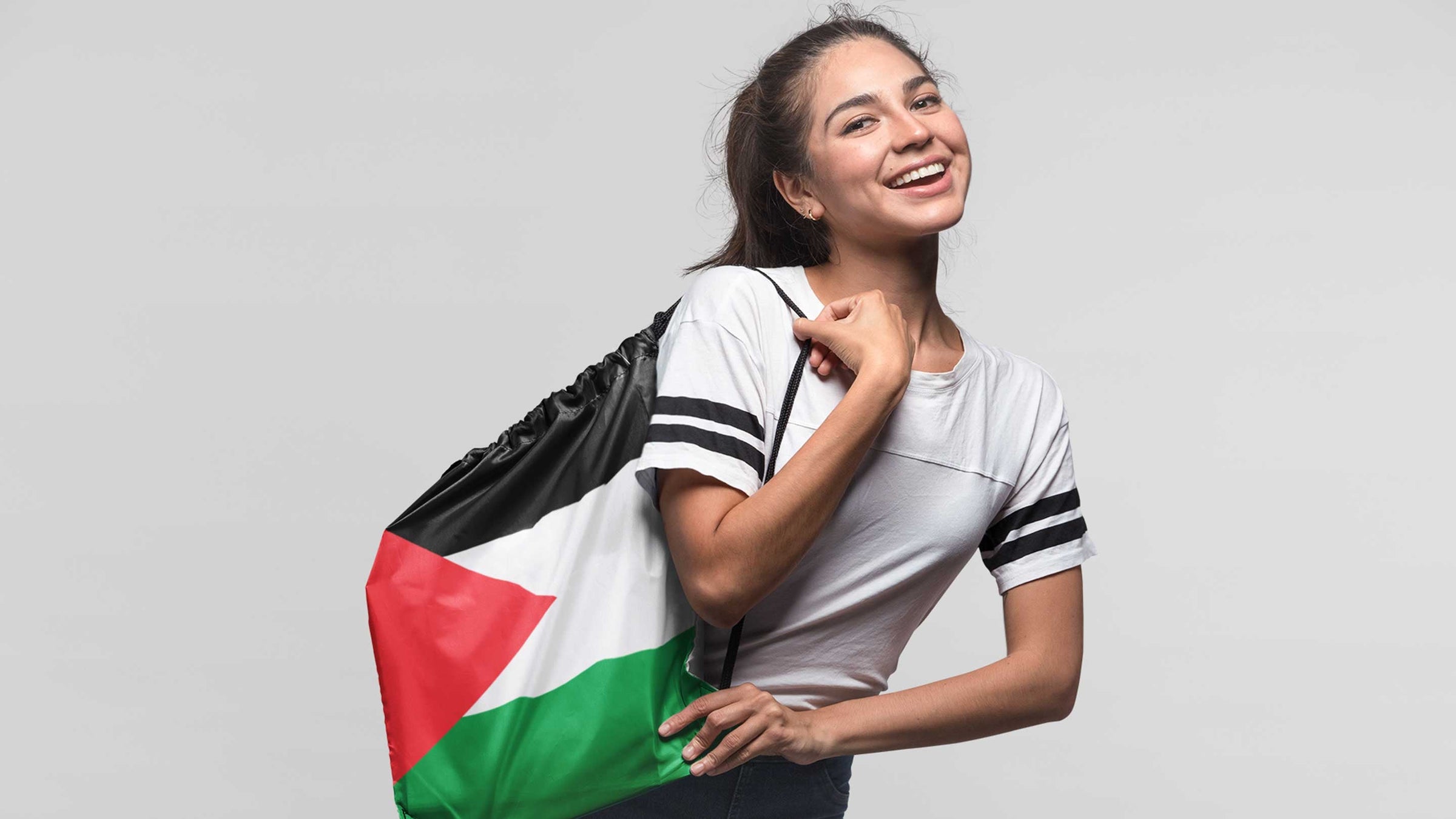 Teen with Palestine print bag