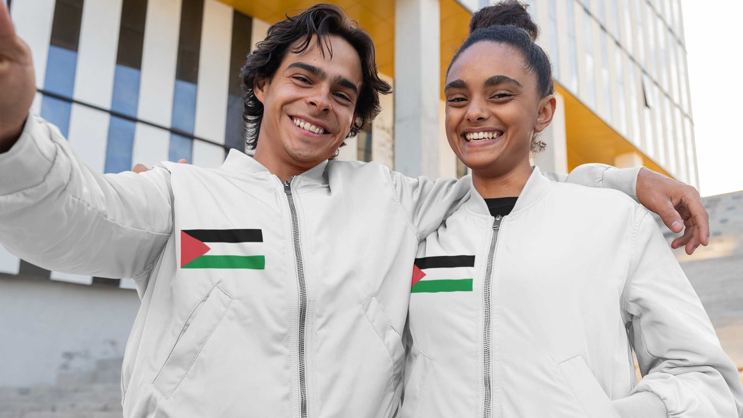 women wearing a jacket with Palestine flag