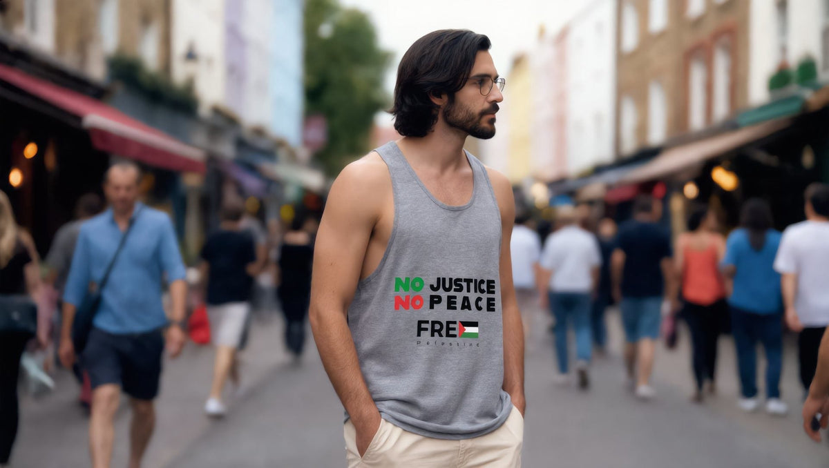 Man wearing a grey No Justice No Peace tank top in Notting Hill, London