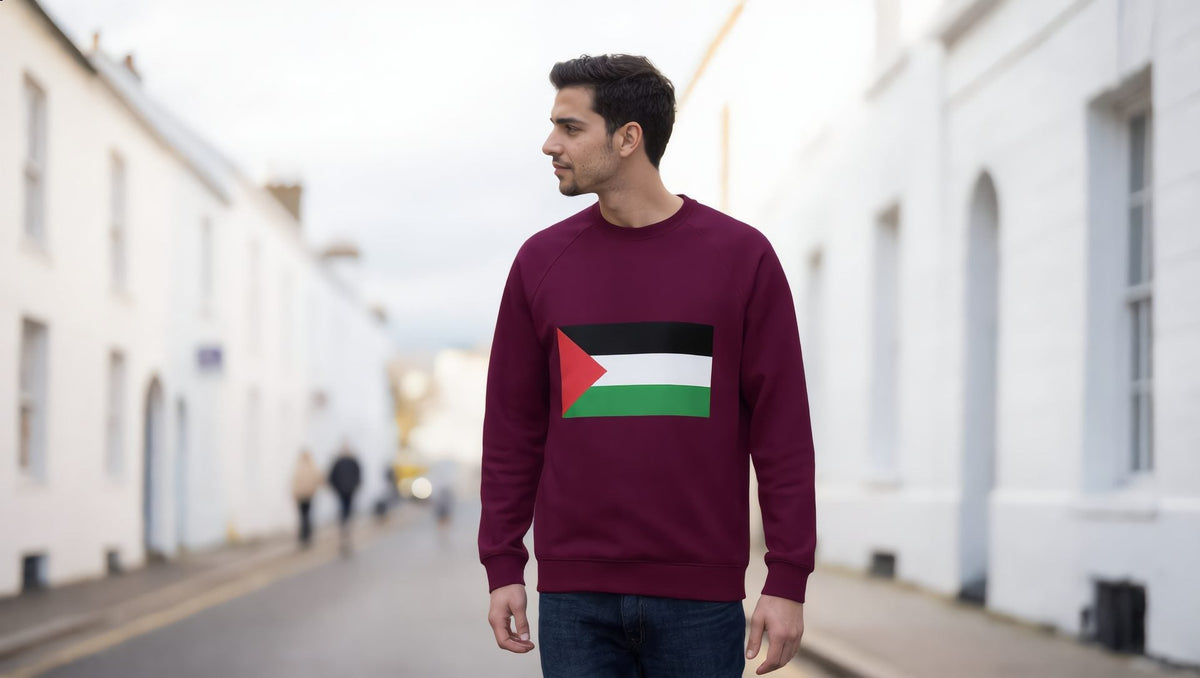 Model wearing a maroon sweatshirt with the Palestinian flag