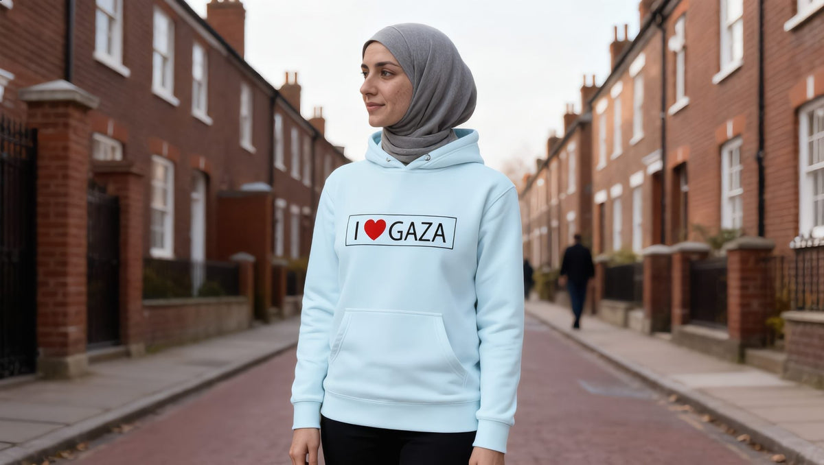 Woman wearing an I Love Gaza hoodie on a street