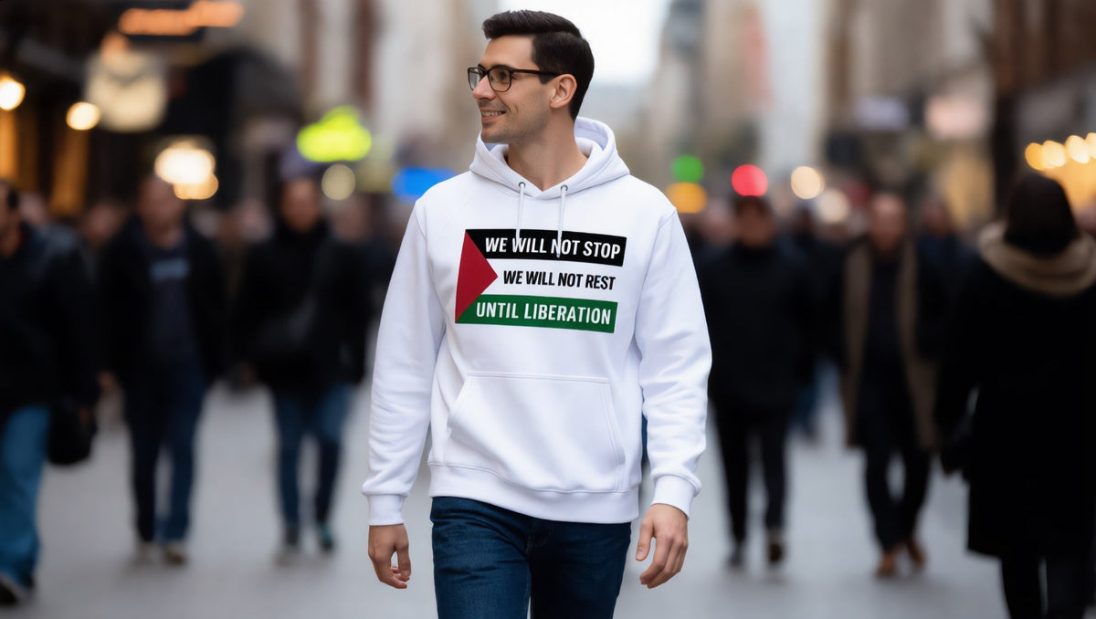 Man wearing a We Will Not Stop hoodie on Oxford Street, Soho, London
